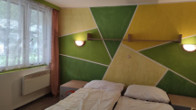 RESORT & CAMP Dešná  chatka Standard Lux - ložnice