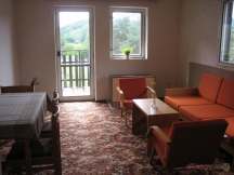 Apartmány Orlík-Loužek Obývák v chatě